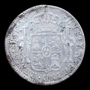 Alternative view of México – 8 Reales – 1794 Mo F.M. – “Carlos IV” – Plata (.903) – 26,63  g – Chopmarked