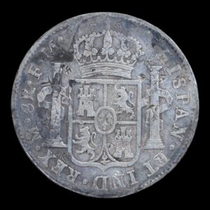 Alternative view of México – 8 Reales de Plata “Carlos IV” – 1799 Mo F.M.– 26,69 g (.903) - Con Resellos