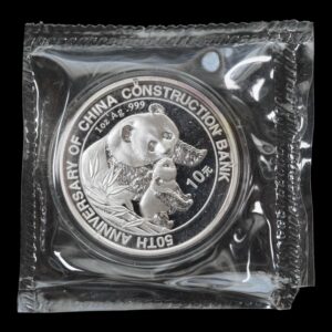 Panda 2004 – Moneda Conmemorativa 10 Yuan China –“50º Aniversario Construcción del Banco “ - 1 Onza de Plata .999 -Sellada